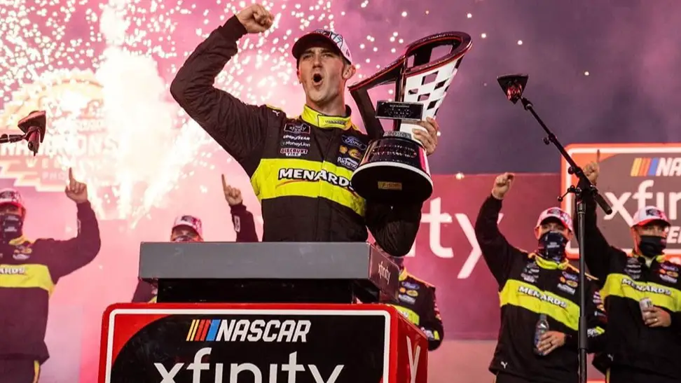 NASCAR Xfinity Series driver Austin Cindric celebrates his Desert Diamond Casino West Valley 200 win and 2020 NASCAR Xfinity Series Championship at Phoenix Raceway