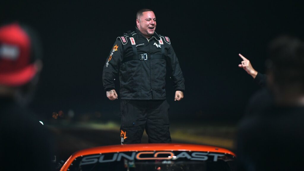 Street Outlaws star Bobby Ducote celebrates his win over Ryan Martin to reach No. 1 on Street Outlaws America’s List during filming near La Villa, Texas