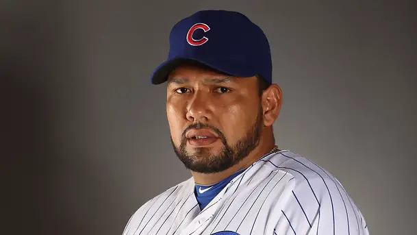 Former Chicago Cubs pitcher Carlos Silva poses for a portrait during media day at Finch Park