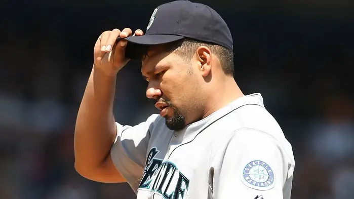 Seattle Mariners pitcher Carlos Silva pauses between pitches against the New York Yankees