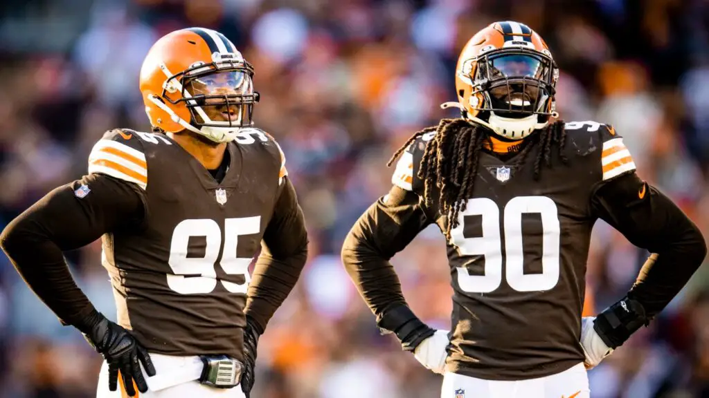 Cleveland Browns defensive ends Myles Garrett and Jadeveon Clowney stand side-by-side during a break in the action against the Baltimore Ravens