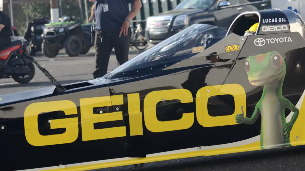 Geico Top Fuel Dragster driver Richie Crampton suited up in his dragster before making a pass at Old Bridge Township Raceway Park