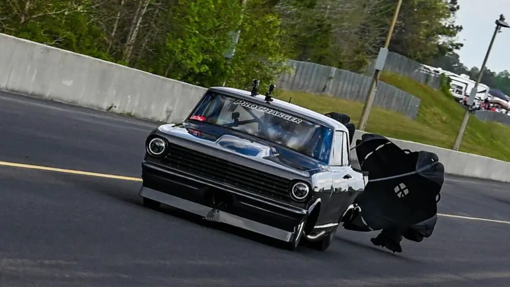 Street Outlaws No Prep Kings star Daddy Dave Comstock at the top end following a pass