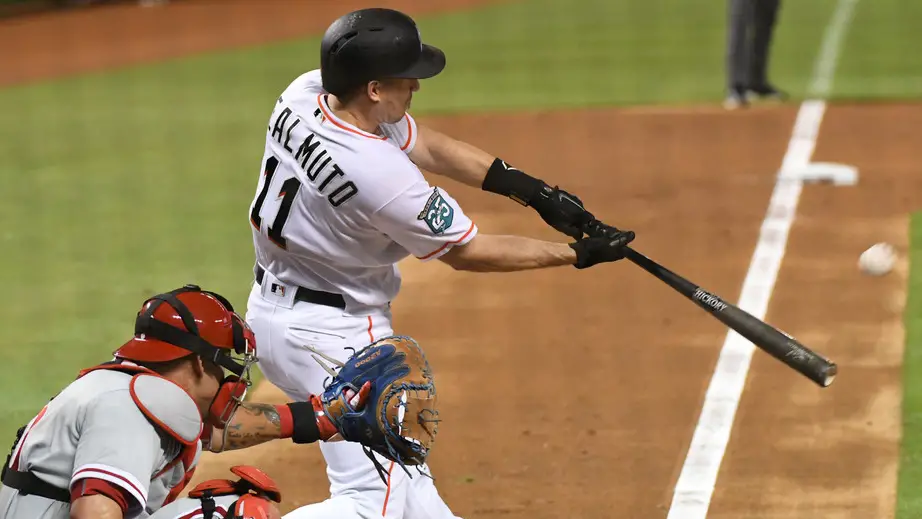 Miami Marlins catcher J.T. Realmuto hits a home run against the Philadelphia Phillies