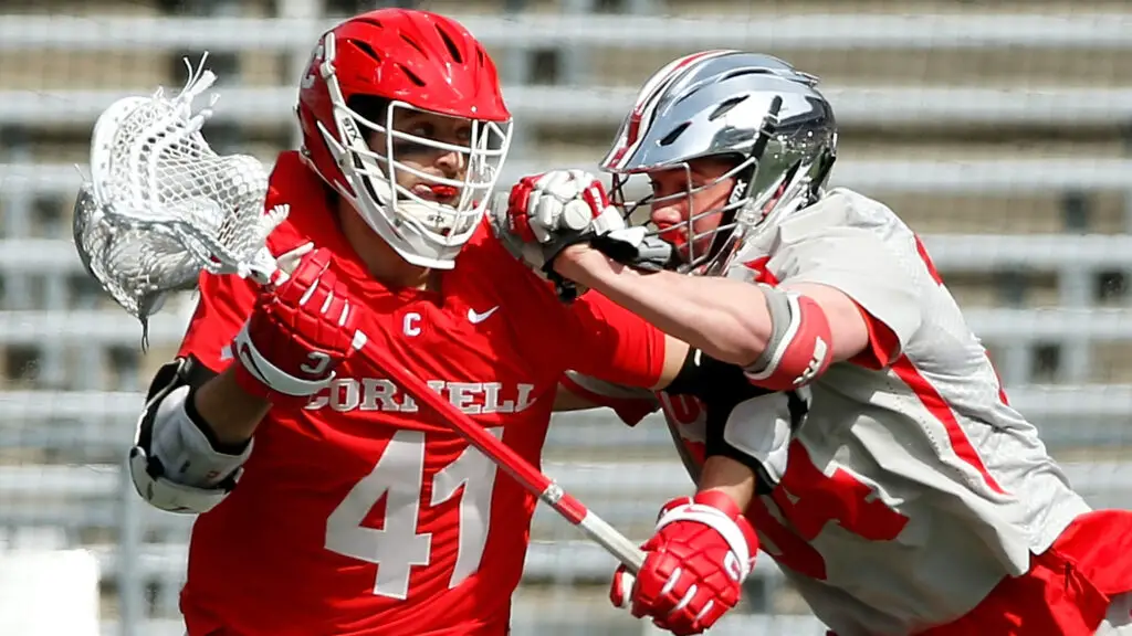 Cornell Big Red Attacker John Piatelli is being guarded by a defender against the Ohio State Buckeyes