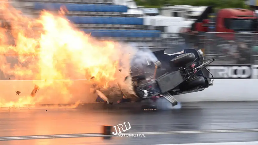 Funny Car driver Kevin Chapman is involved in an accident at Santa Pod Raceway