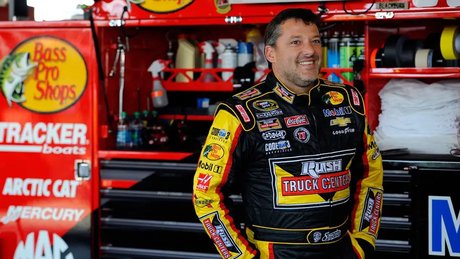 NASCAR Cup Series driver Tony Stewart looks on in the garage area during practice for the Cheez-It 355 at Watkins Glen International
