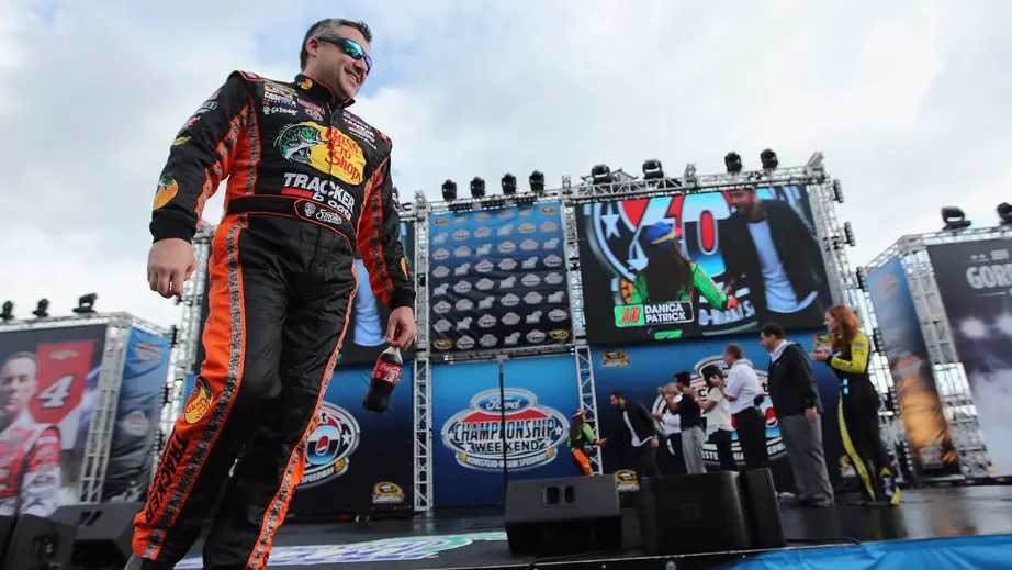 NASCAR Cup Series driver Tony Stewart is introduced during pre-race ceremonies for the Ford EcoBoost 400