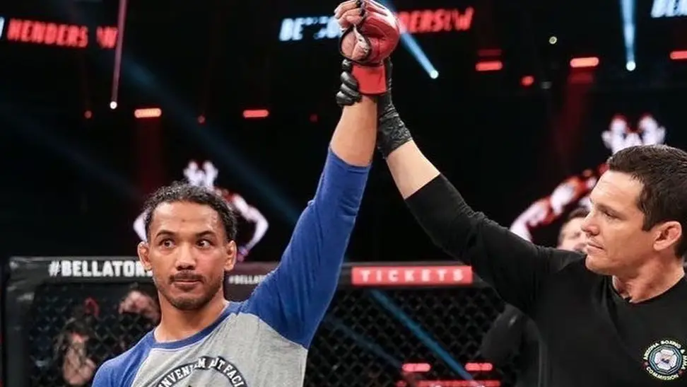 Combat Sports fighter Benson Henderson has his hand raised following a bout at an event