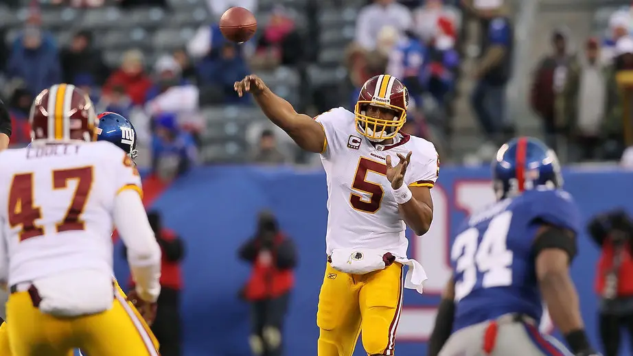 Washington Redskins quarterback Donovan McNabb throws a pass against the New York Giants