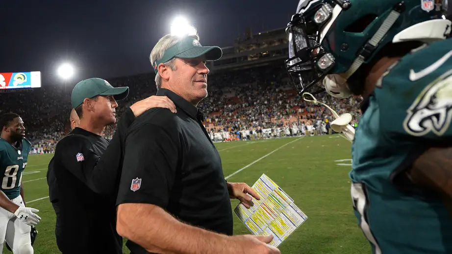 Former Philadelphia Eagles head coach Doug Pederson celebrates with strong safety Malcolm Jenkins in their comeback win over the Los Angeles Rams