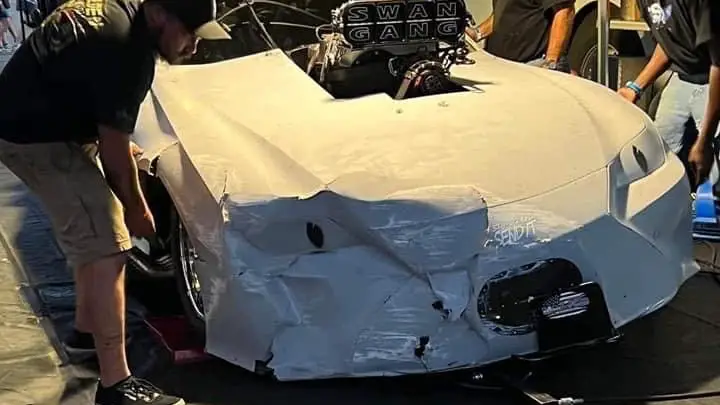 Street Outlaws No Prep Kings star Justin Swanstrom and his team are working to repair during the filming at Houston Raceway Park 