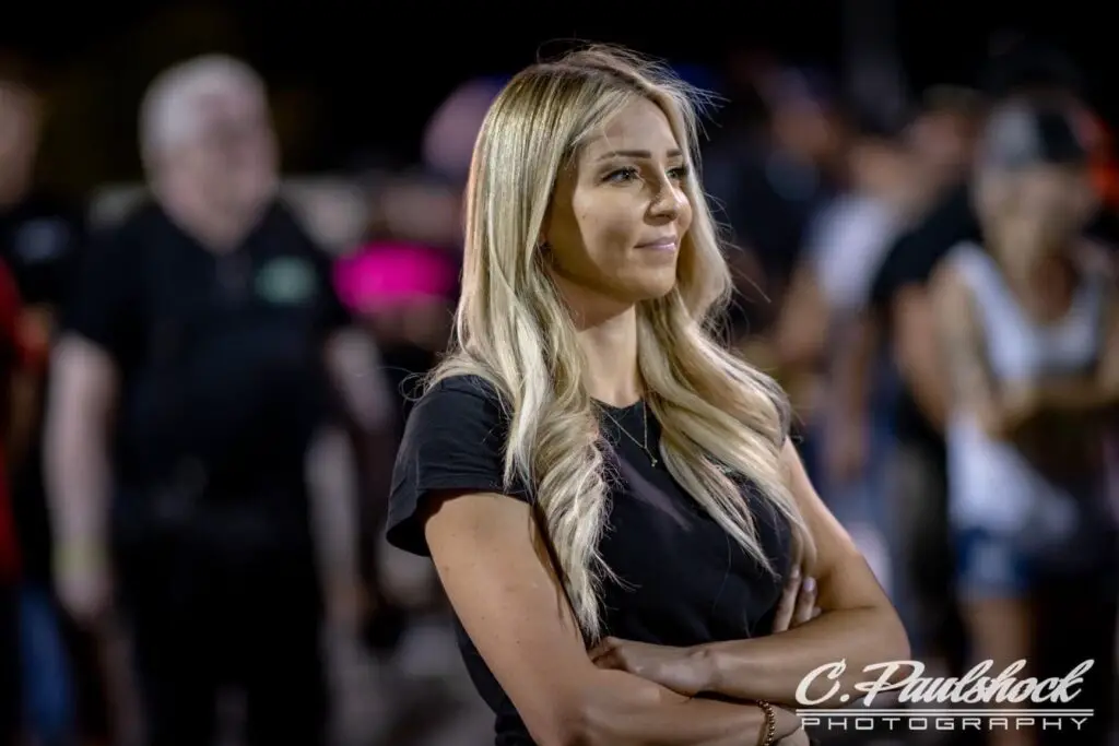 Street Outlaws No Prep Kings star Lizzy Musi looks on near the starting line during filming