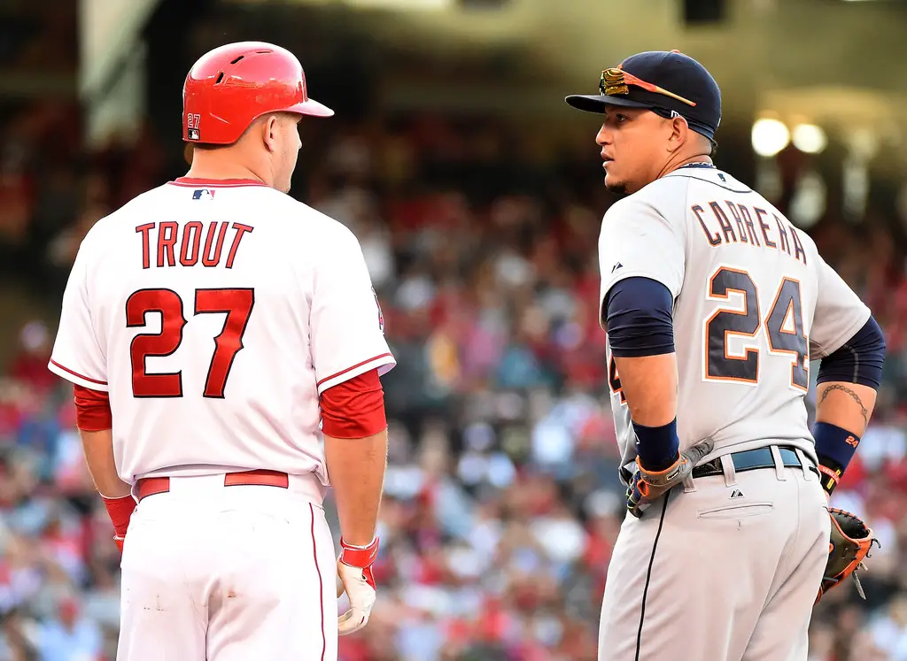 Los Angeles Angels star Mike Trout talks with Detroit Tigers star Miguel Cabrera at first base during the fifth inning between the Angels and the Tigers