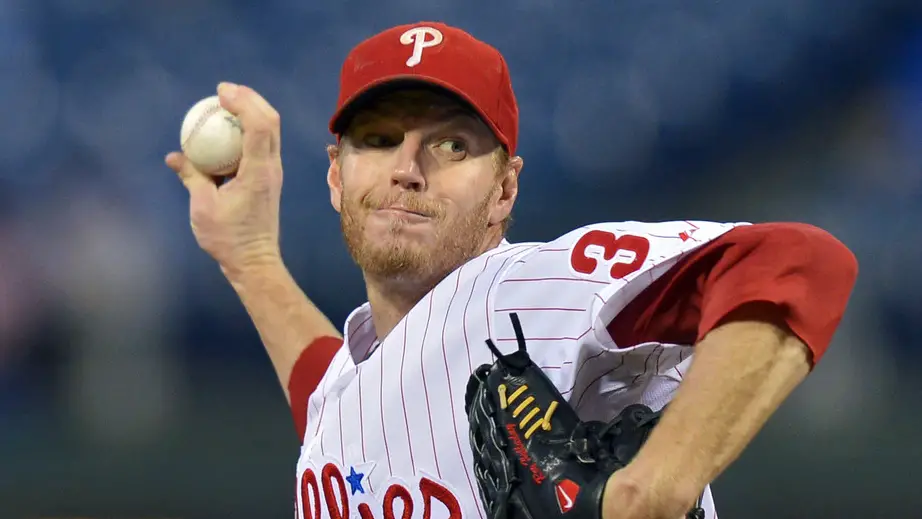 Former Philadelphia Phillies pitcher Roy Halladay throws a pitch against the Miami Marlins