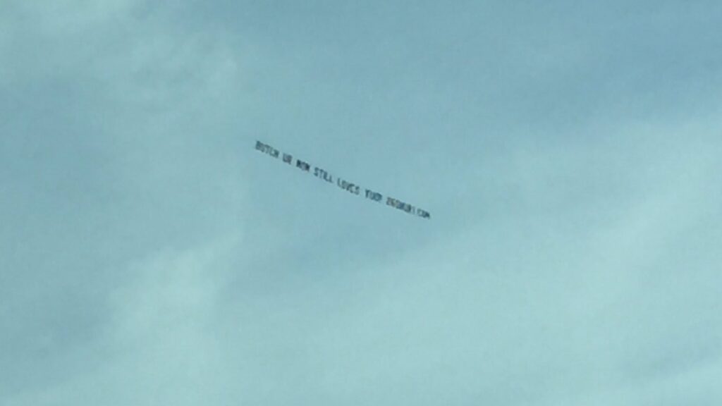 A banner saying "Butch ur mom still loves you" flies in the sky before the Tennessee Volunteers vs. Alabama Crimson Tide game