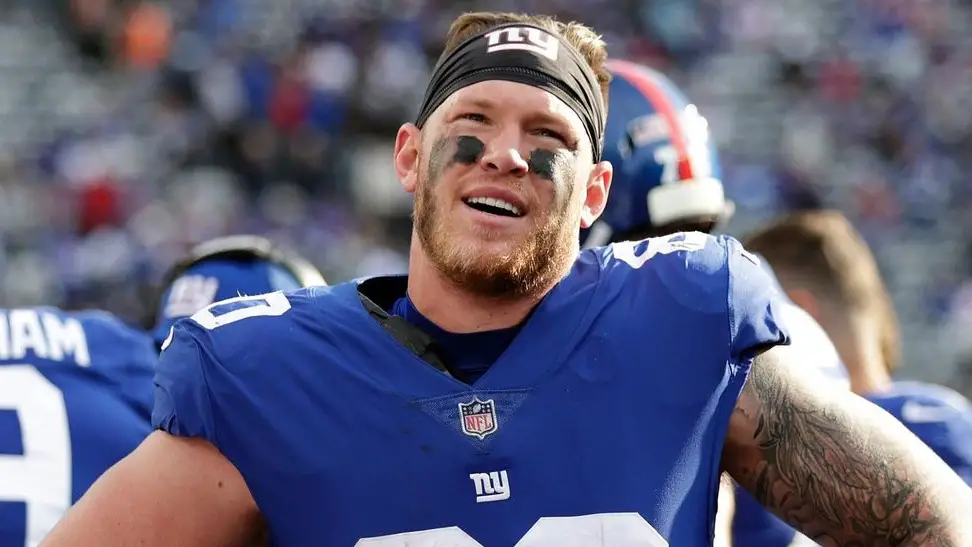 Former New York Giants tight end Kyle Rudolph looks on during a game