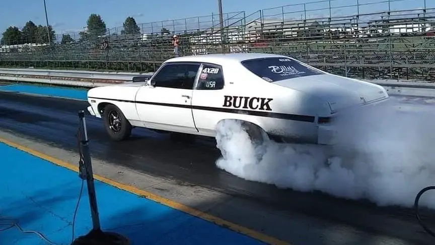 A driver doing a burnout at Bunker Hill Dragstrip at an event