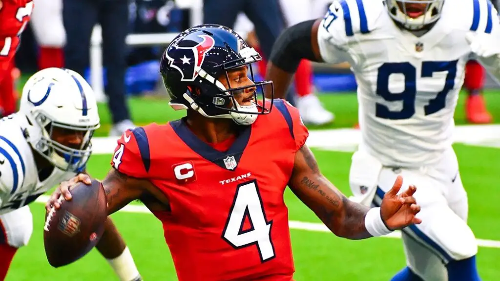 Former Houston Texans quarterback Deshaun Watson attempts to throw the football against the Indianapolis Colts