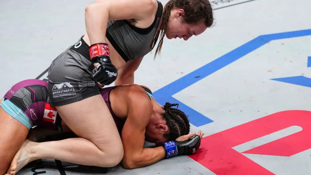 PFL fighter Aspen Ladd punches Julia Budd as she is down in the guard during the 2022 PFL Championships 