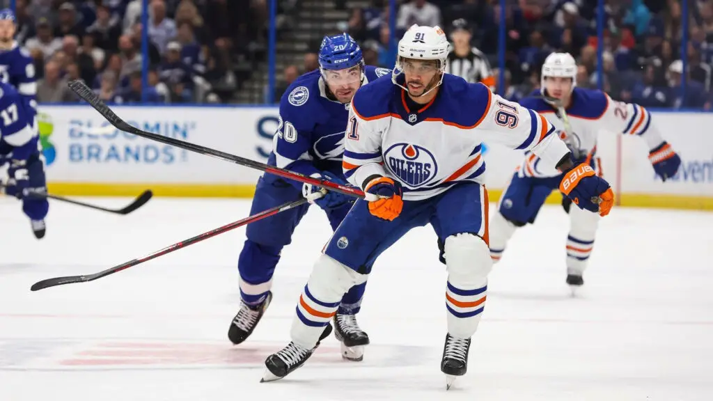Edmonton Oilers player Evander Kane skates to get the puck against the Tampa Bay Lightning during the first period
