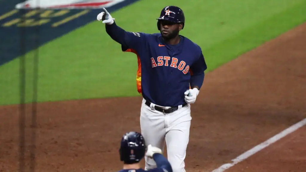 Houston Astros slugger Yordan Alvarez points to the stands after hitting a home run against the Philadelphia Phillies in Game 6 of the 2022 World Series 