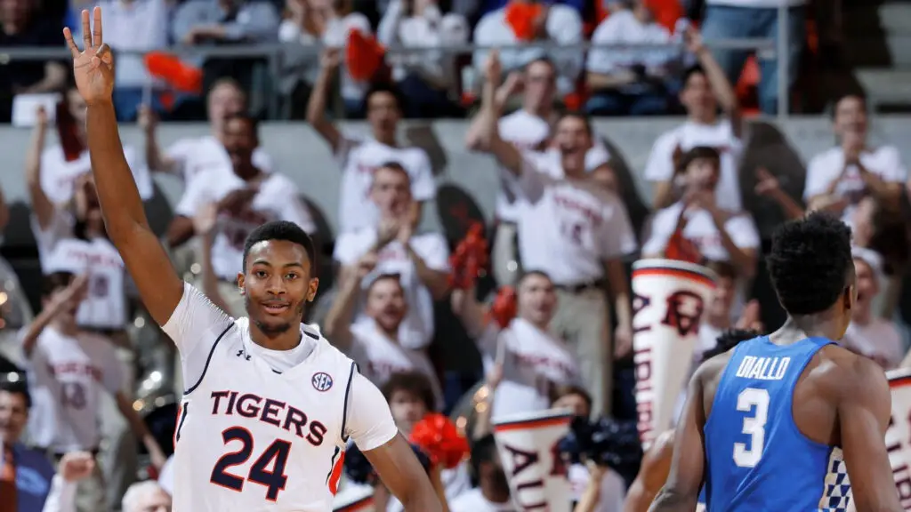 Auburn Tigers player Anfernee McLemore reacts after making a three-point basket against the Kentucky Wildcats in the first half of the game