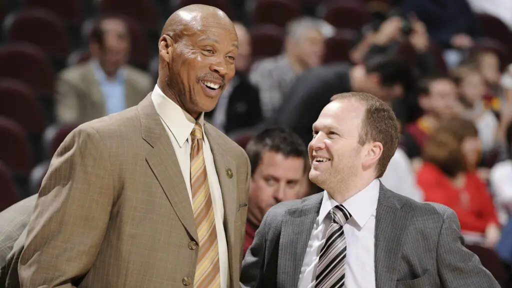Former Cleveland Cavaliers head coach Byron Scott shares a laugh with Detroit Pistons head coach Lawrence Frank prior to their game