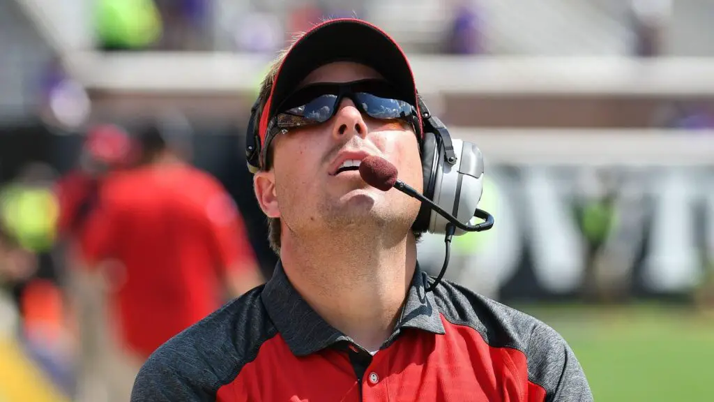 North Carolina State Wolfpack offensive coordinator/quarterbacks coach Eliah Drinkwitz in a game between the East Carolina Pirates and the NC State Wolfpack