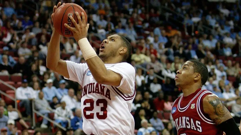 Former Indiana Hoosiers guard Eric Gordon drives past Patrick Beverley and Gary Ervin against the Arkansas Razorbacks during the first round of the 2008 NCAA Men's Basketball Tournament East Regional