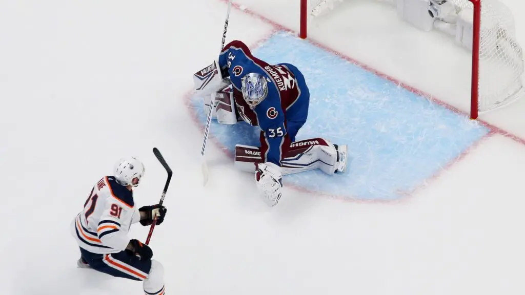 Edmonton Oilers star Evander Kane scores against goaltender Darcy Kuemper against the Colorado Avalanche in Game One of the Western Conference Final of the 2022 Stanley Cup Playoffs