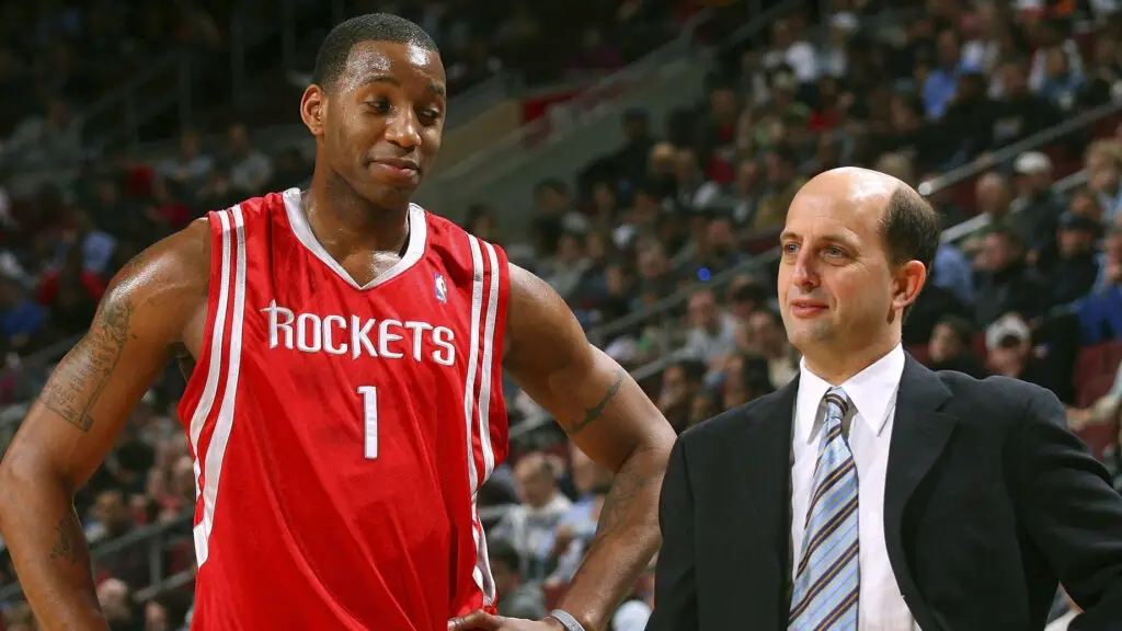 Houston Rockets head coach Jeff Van Gundy speaks with Tracy McGrady during the game against the Philadelphia 76ers