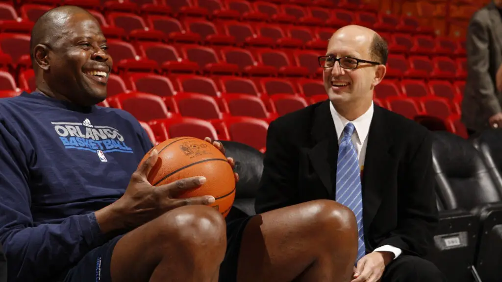 Former NBA head coach Jeff Van Gundy speaks with NBA legend Patrick Ewing prior to the game between the Orlando Magic and the Miami Heat