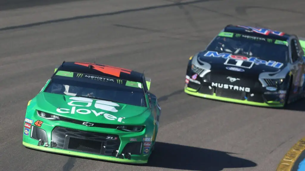 NASCAR Cup Series driver Kyle Larson leads Kevin Harvick during the Monster Energy NASCAR Cup Series Bluegreen Vacations 500