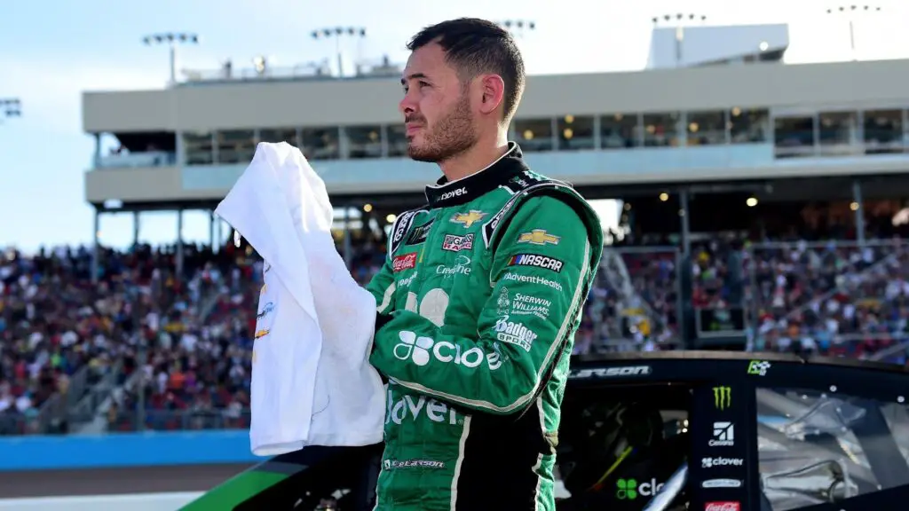 NASCAR Cup Series driver Kyle Larson stands on the grid after failing to make the championship race following the Monster Energy NASCAR Cup Series Bluegreen Vacations 500