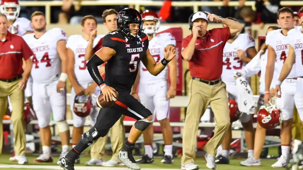 Texas Tech Red Raiders quarterback Patrick Mahomes runs with the football during the game against the Oklahoma Sooners