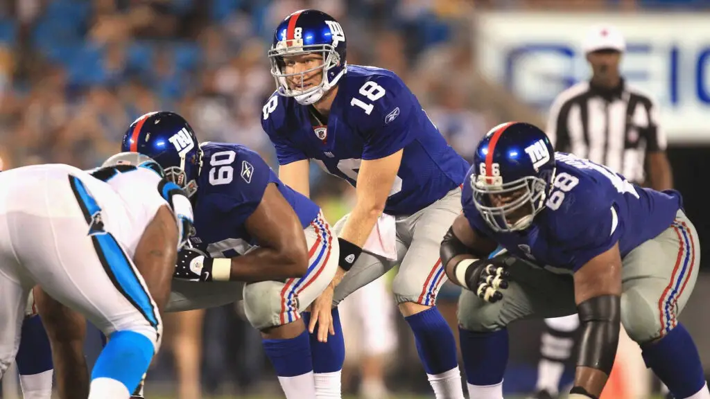 Former New York Giants quarterback Sage Rosenfels gets ready to accept the snap against the Carolina Panthers during their preseason game
