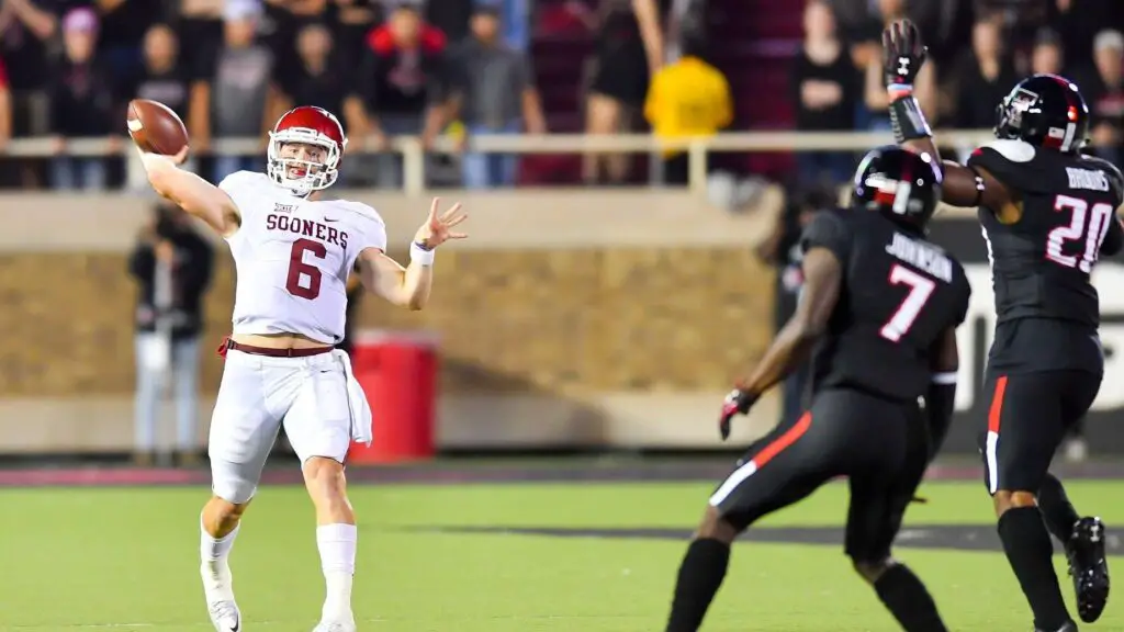 Oklahoma Sooners quarterback Baker Mayfield throws a pass during the game against the Texas Tech Red Raiders