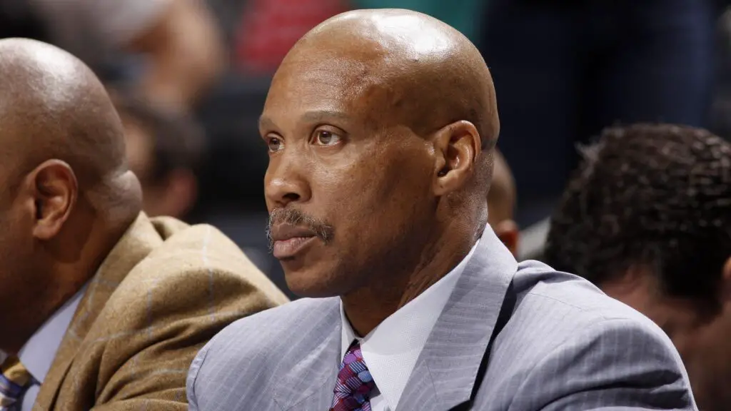 Former Cleveland Cavaliers head coach Byron Scott sits on the bench during the game against the Charlotte Bobcats