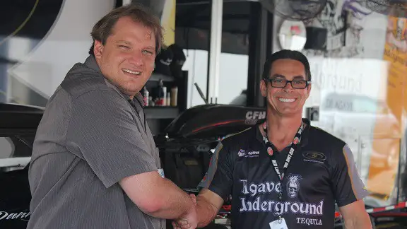 NHRA Pro Mod driver Danny Rowe shaking hands with our Publisher Anthony Caruso III at a national event at Old Bridge Township Raceway Park