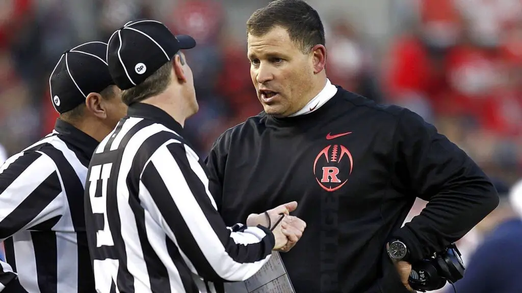Former Rutgers Scarlet Knights head coach Greg Schiano talks to the officials during the New Era Pinstripe Bowl against the Iowa State Cyclones