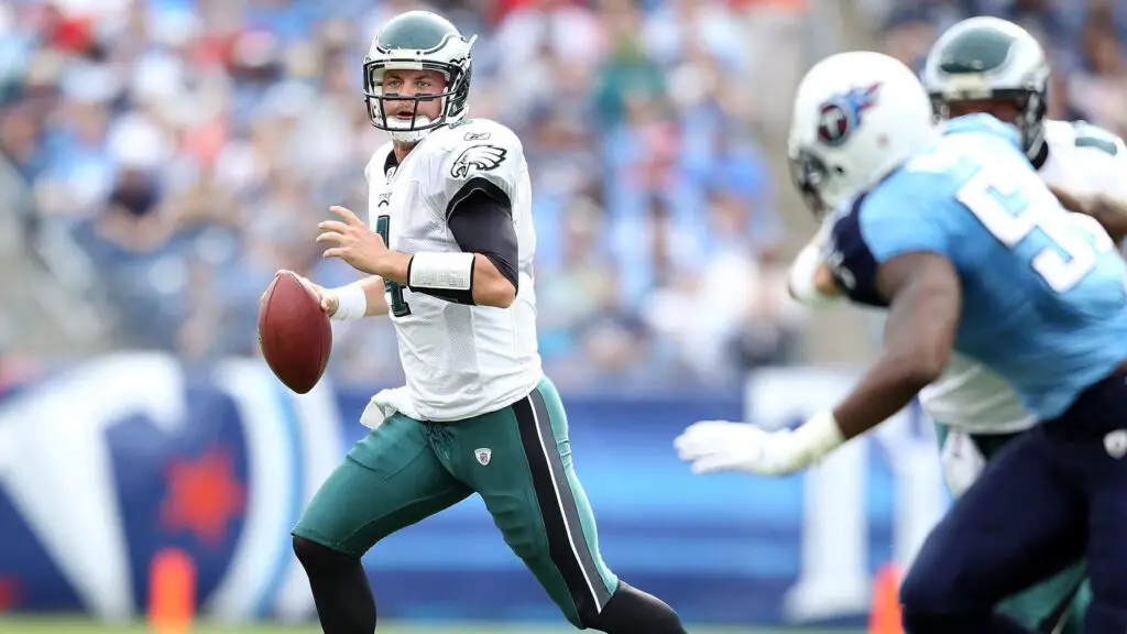 Philadelphia Eagles quarterback Kevin Kolb runs with the football during their NFL game against the Tennessee Titans