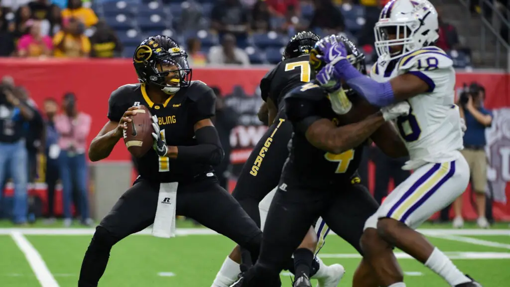 Grambling State Tigers quarterback Devante Kincade looks to throw downfield during the SWAC Championship football game between the Alcorn State Braves and the Grambling State Tigers