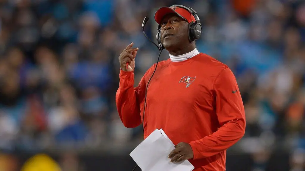 Former Tampa Bay Buccaneers head coach Lovie Smith watches his team during their game against the Carolina Panthers