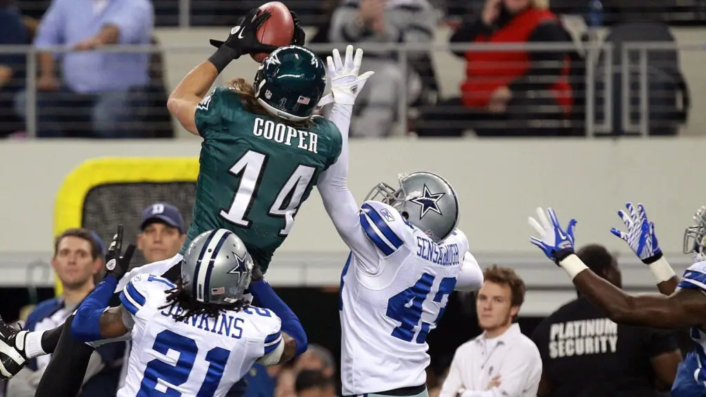 Philadelphia Eagles wide receiver Riley Cooper makes a reception against Mike Jenkins and Gerald Sensabaugh against the Dallas Cowboys