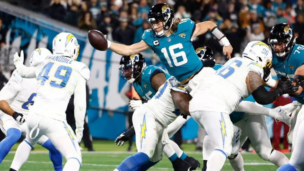 Jacksonville Jaguars quarterback Trevor Lawrence dives for a two-point conversion in the AFC Wild Card Game against the Los Angeles Chargers