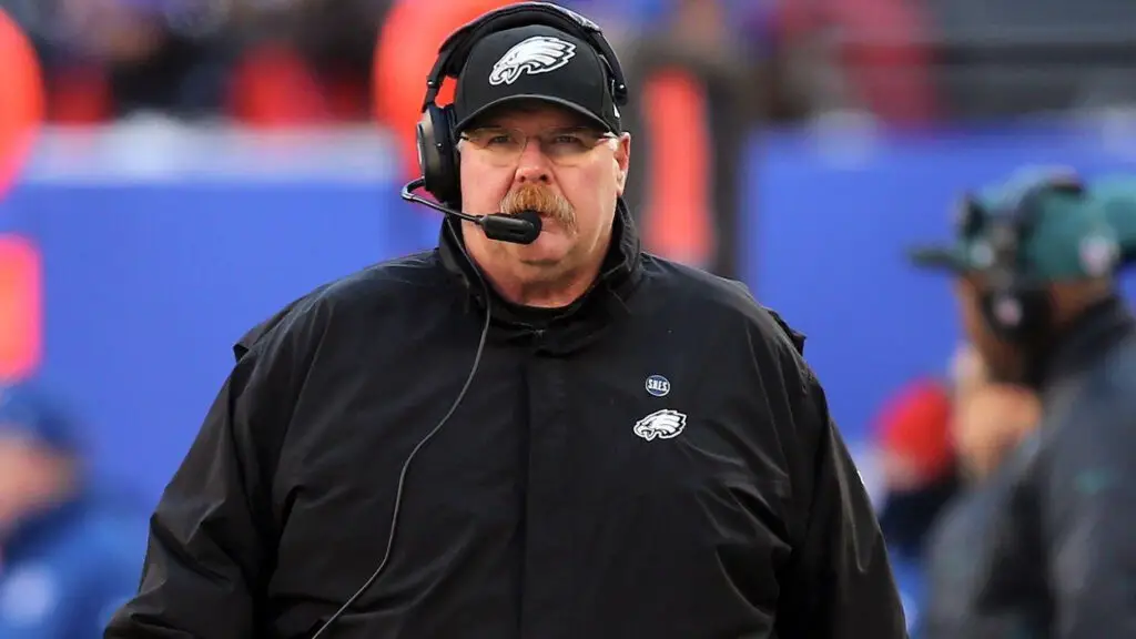 Former Philadelphia Eagles head coach Andy Reid walks the sideline in the first half against the New York Giants