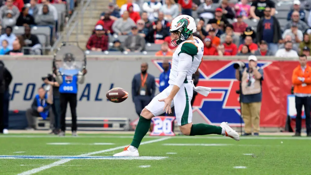 Seattle Dragons punter Brock Miller punts the ball during the XFL game against the Houston Roughnecks