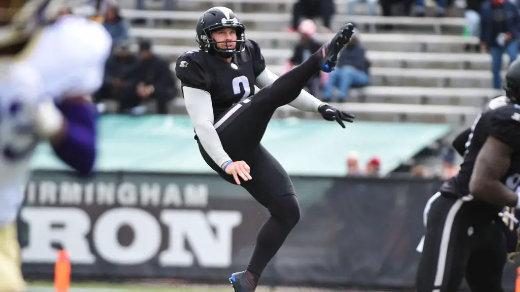 Birmingham Iron punter Colton Schmidt punts the ball during the first half of the Alliance of American Football game against the Atlanta Legends