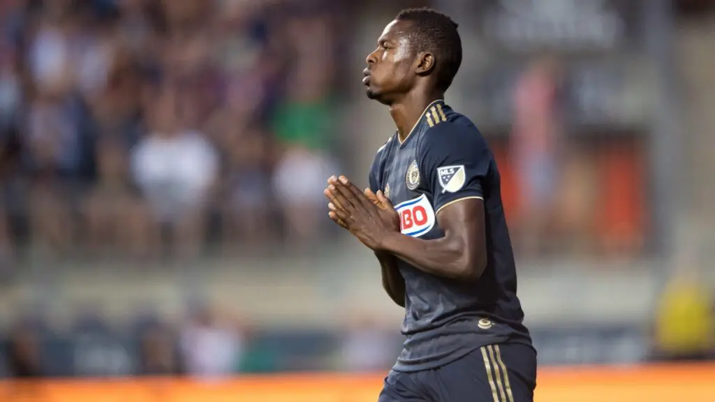 Philadelphia Union Forward Cory Burke prays after reacting to a missed scoring opportunity in the second half during the game between Atlanta United